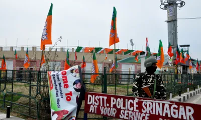 in pictures  srinagar decked up with flags  buntings to welcome pm modi