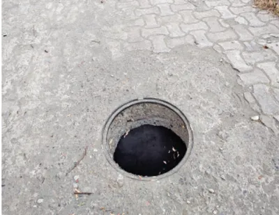 open manholes at nigeen pose risk to pedestrians