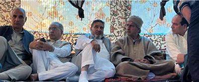 altaf bukhari offers condolences to pdp’s sartaj madni on passing away of his son