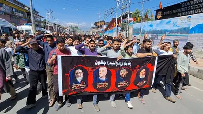 iranian president s death  shia community carries out solidarity march in magam budgam