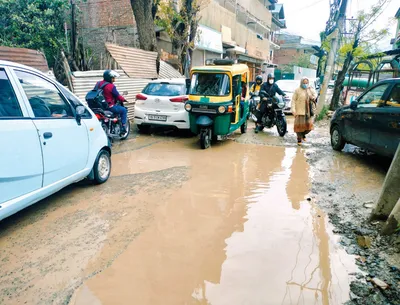 dilapidated malabagh road takes toll on commuters