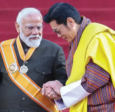 handshake   honour   india  bhutan chart course for stronger ties