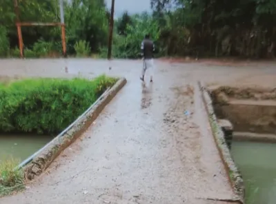 absence of proper bridge in bandipora village causes hardships to people