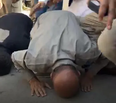 engineer rashid touches down in srinagar  bows down on road