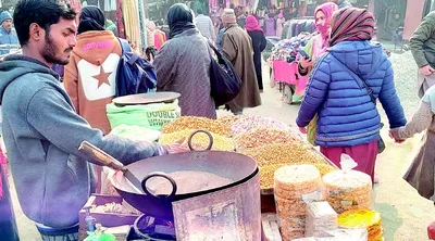 amid bone chilling cold  how roadside vendors earn livelihood in srinagar