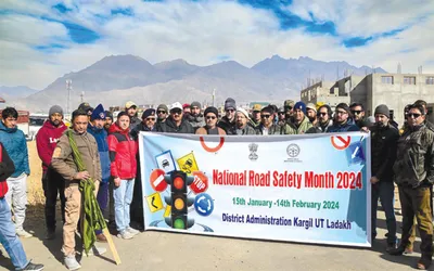 national road safety month   cec lahdc kargil flags off transport rally