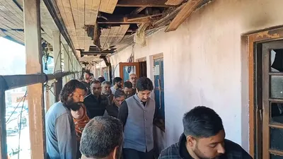 newly elected mla peerzada mohammad syed and dc anantnag visit fire victims at mattan chowk