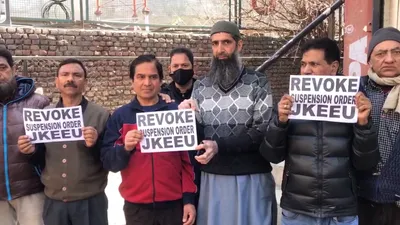 pdd employees hold silent protest in srinagar  demand reinstatement of suspended colleagues