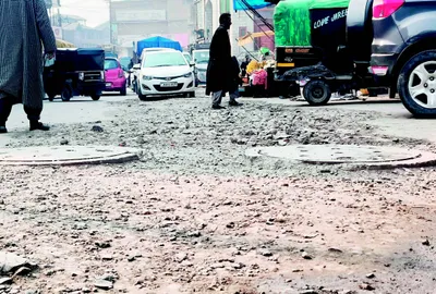 dilapidated roads take toll on commuters in srinagar