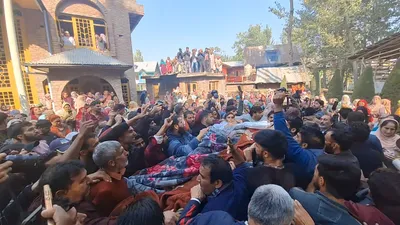 gagangeer attack  thousands participate in last rites of slain doctor in naidgam budgam