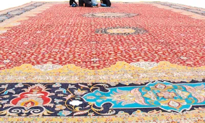 woven legacy  kashmir artisans craft asia s biggest handmade carpet