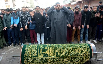 hundreds attend inspector masroor’s funeral